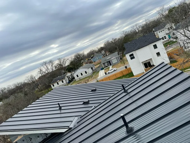 Standing seam metal roof panels with vents for Skylight Repair in Lake Park